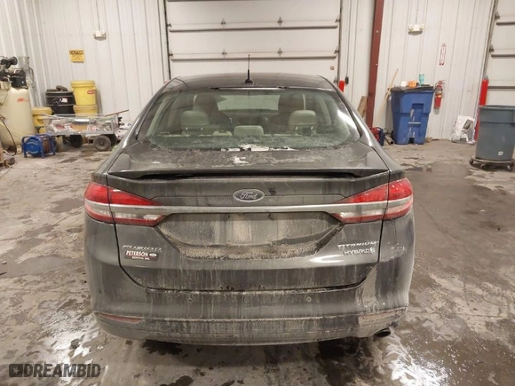 2018 Ford Fusion Hybrid Titanium with VIN 3FA6P0RU4JR147831, listed as a IAAI auction lot 41586033 with 101,088 mi miles. Bid and sale history available at carsss.com. Image 16.