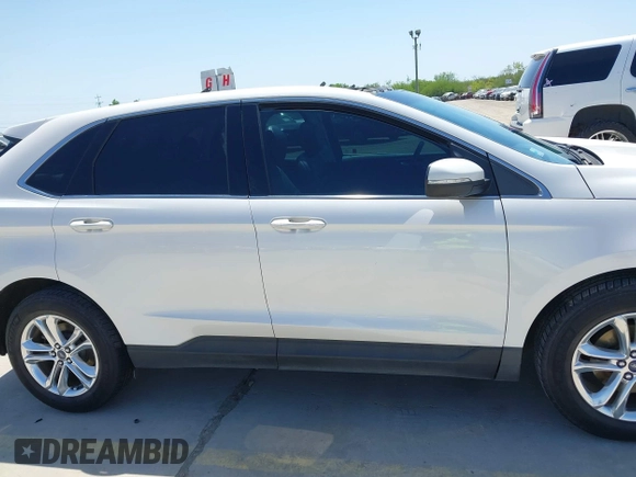 2015 Ford Edge SEL with VIN 2FMTK3J97FBC16209, listed as a IAAI auction lot 41974393 with 129,608 mi miles. Bid and sale history available at carsss.com. Image 14.