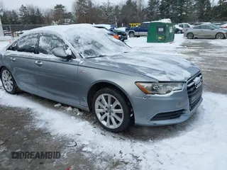 2014 Audi A6 Premium Plus z VIN WAUFGAFC4EN055328, wystawiony jako IAAI lot #41517725 z przebiegiem 169 345 mil mil oraz . Historia ofert i sprzedaży dostępna na DreamBid. Obrazek 1.