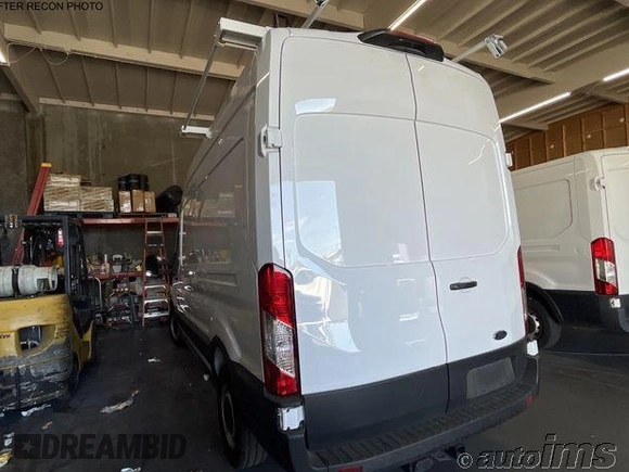 2023 Ford Transit Cargo with VIN 1FTBR1X83PKC02653, listed as a IAAI auction lot 42789310 with 242 mi miles and . Bid and sale history available at DreamBid. Image 5.