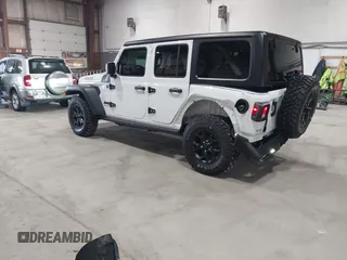 2023 Jeep Wrangler Sport S with VIN 1C4HJXDN2PW632584, listed as a IAAI auction lot 41965191 with 20,288 mi miles and . Bid and sale history available at DreamBid. Image 3.