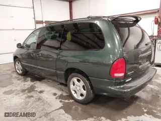 2000 Dodge Caravan SE with VIN 1B4GP44G4YB651833, listed as a IAAI auction lot 41252033 with 185,924 mi miles. Bid and sale history available at carsss.com. Image 3.