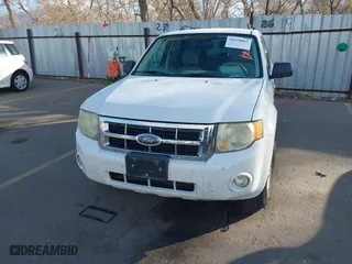 2008 Ford Escape Hybrid with VIN 1FMCU59H58KD75563, listed as a IAAI auction lot 41939067 with 127,609 mi miles. Bid and sale history available at carsss.com. Image 6.