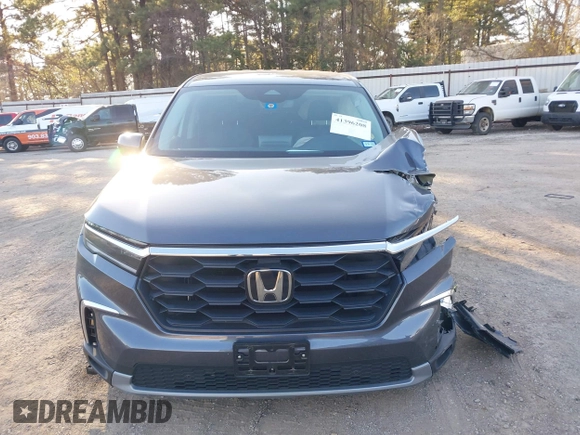 2023 Honda Pilot EX-L with VIN 5FNYG1H5XPB044829, listed as a IAAI auction lot 41396208 with 15,277 mi miles and . Bid and sale history available at DreamBid. Image 13.