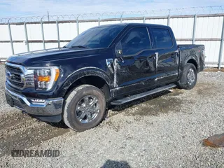 2023 Ford F-150 XL with VIN 1FTFW1E53PKG07088, listed as a IAAI auction lot 41442237 with 21,403 mi miles. Bid and sale history available at carsss.com. Image 18.