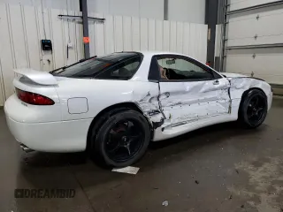 1996 Mitsubishi 3000GT GT z VIN JA3AM84J5TY002387, wystawiony jako Copart lot #64983534 z przebiegiem 149 380 mil mil oraz Szkody całkowita. Historia ofert i sprzedaży dostępna na DreamBid. Obrazek 3.