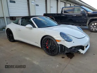 2016 Porsche 911 4S with VIN WP0BB2A93GS136097, listed as a Copart auction lot 76078574 with 14,208 mi miles and Salvage Title. Bid and sale history available at DreamBid. Image 4.