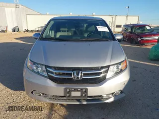 2014 Honda Odyssey Touring with VIN 5FNRL5H97EB094353, listed as a IAAI auction lot 41701712 with 141,228 mi miles and . Bid and sale history available at DreamBid. Image 13.