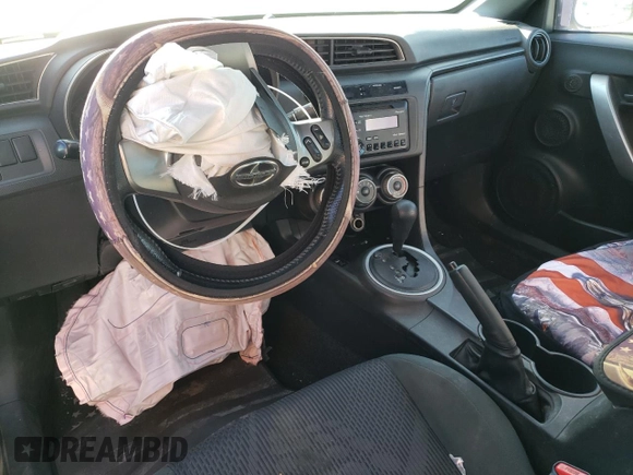 2012 Scion tC z VIN JTKJF5C71C3040608, wystawiony jako Copart lot #53704565 z przebiegiem Nie podano mil oraz Szkoda całkowita • Salvage title. Historia ofert i sprzedaży dostępna na DreamBid. Obrazek 8.