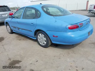 1999 Ford Taurus SE with VIN 1FAFP53U2XA154351, listed as a IAAI auction lot 41943794 with 125,085 mi miles. Bid and sale history available at carsss.com. Image 3.