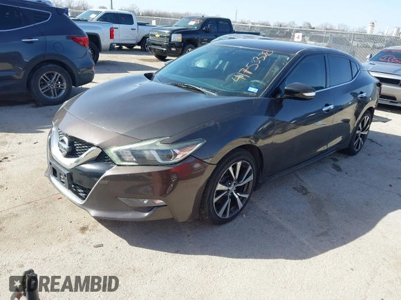 2016 Nissan Maxima Platinum with VIN 1N4AA6AP2GC385723, listed as a IAAI auction lot 41753328 with 162,845 mi miles and . Bid and sale history available at DreamBid. Image 17.