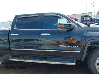 2016 GMC Sierra 2500HD Denali z VIN 1GT12UE84GF259750, wystawiony jako IAAI lot #42221632 z przebiegiem 201 055 mil mil oraz . Historia ofert i sprzedaży dostępna na DreamBid. Obrazek 14.