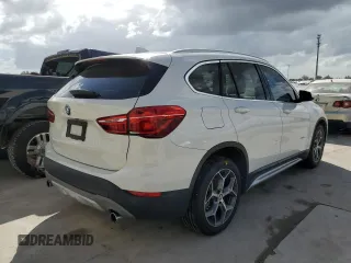 2018 BMW X1 sDrive28i with VIN WBXHU7C38J5H40248, listed as a Copart auction lot 66158662 with 59,903 mi miles. Bid and sale history available at carsss.com. Image 4.