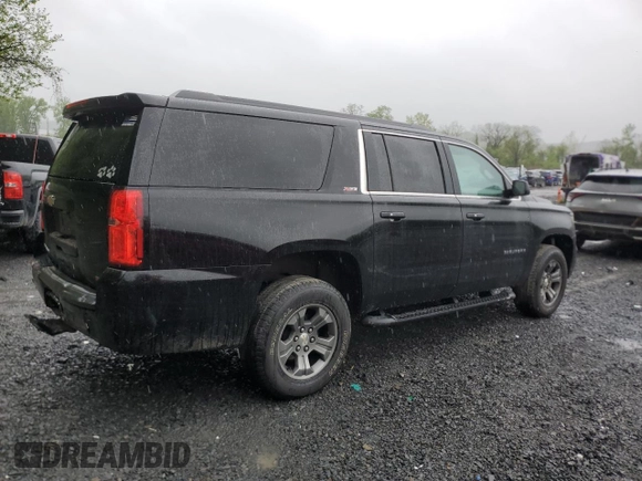 2018 Chevrolet Suburban LT with VIN 1GNSKHKC6JR130670, listed as a Copart auction lot 55339695 with 98,180 mi miles and Salvage Title. Bid and sale history available at DreamBid. Image 3.