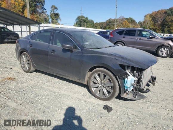 2021 Mazda 6 Signature with VIN JM1GL1XY0M1617051, listed as a Copart auction lot 76715774 with 43,925 mi miles and Salvage Title. Bid and sale history available at DreamBid. Image 4.