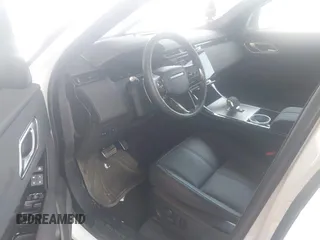 2025 Land Rover Range Rover Velar Dynamic SE with VIN SALYL2EX2SA810750, listed as a IAAI auction lot 42118663 with 4,499 mi miles and . Bid and sale history available at DreamBid. Image 5.