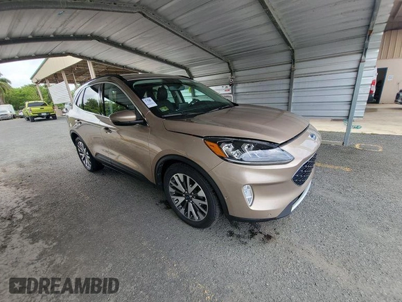 2020 Ford Escape Titanium Hybrid with VIN 1FMCU0DZ5LUB81972, listed as a IAAI auction lot 42679188 with 19,400 mi miles and . Bid and sale history available at DreamBid. Image 12.