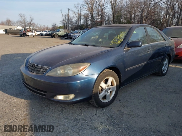 2003 Toyota Camry LE with VIN 4T1BE32K03U241866, listed as a IAAI auction lot 41778603 with 181,603 mi miles and . Bid and sale history available at DreamBid. Image 2.