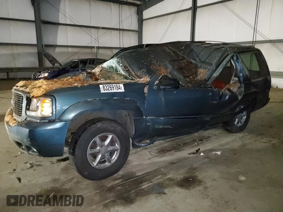 1999 GMC Denali z VIN 1GKEK13R5XR918465, wystawiony jako Copart lot #83269184 z przebiegiem Nie podano mil oraz Nie do naprawy. Historia ofert i sprzedaży dostępna na DreamBid. Obrazek 1.