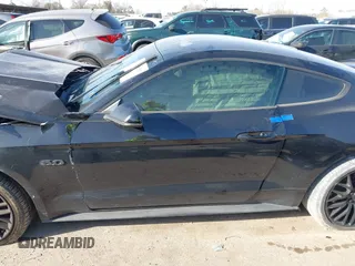 2016 Ford Mustang GT z VIN 1FA6P8CF7G5245952, wystawiony jako IAAI lot #41744923 z przebiegiem 105 541 mil mil oraz . Historia ofert i sprzedaży dostępna na DreamBid. Obrazek 14.