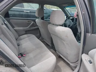 2001 Toyota Camry CE with VIN 4T1BG22K01U060588, listed as a IAAI auction lot 42040071 with 165,446 mi miles and . Bid and sale history available at DreamBid. Image 8.