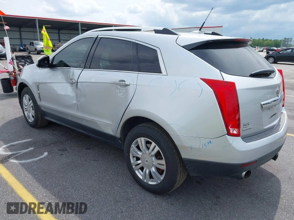 2011 Cadillac SRX Luxury Collection with VIN 3GYFNAEY5BS563048, listed as a IAAI auction lot 42031973 with 182,047 mi miles and . Bid and sale history available at DreamBid. Image 3.
