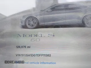 2013 Tesla Model S with VIN 5YJSA1DG7DFP11382, listed as a IAAI auction lot 42056169 with 126,975 mi miles. Bid and sale history available at carsss.com. Image 15.