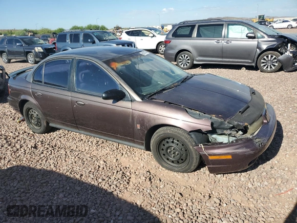 1999 Saturn SL with VIN 1G8ZK527XXZ136922, listed as a Copart auction lot 86704404 with 134,897 mi miles and Salvage Title. Bid and sale history available at carsss.com. Image 4.