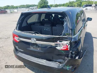 2018 Honda Odyssey EX-L z VIN 5FNRL6H76JB032182, wystawiony jako IAAI lot #42413124 z przebiegiem 67 402 mil mil oraz . Historia ofert i sprzedaży dostępna na DreamBid. Obrazek 6.