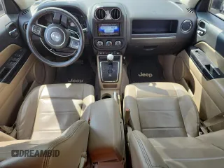 2015 Jeep Patriot High Altitude with VIN 1C4NJRFB5FD114125, listed as a Copart auction lot 62475615 with 104,438 mi miles and Salvage title. Bid and sale history available at DreamBid. Image 8.