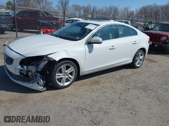 2014 Volvo S60 T5 с VIN YV1612FS1E2297930, выставлен на аукционе IAAI как лот 41906564 с пробегом 88 843 миль миль и . История ставок и продаж доступна на DreamBid. Изображение 2.