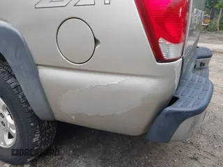 2004 Chevrolet Avalanche Z71 z VIN 3GNEK12TX4G226357, wystawiony jako IAAI lot #42507205 z przebiegiem 200 631 mil mil oraz . Historia ofert i sprzedaży dostępna na DreamBid. Obrazek 13.