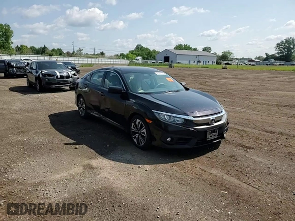 2016 Honda Civic EX-L z VIN 19XFC1F70GE002599, wystawiony jako Copart lot #60424185 z przebiegiem 113 707 mil mil oraz Szkoda całkowita • Salvage title. Historia ofert i sprzedaży dostępna na DreamBid. Obrazek 13.