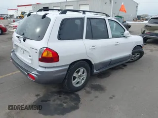 2004 Hyundai Santa Fe GLS with VIN KM8SC13DX4U609921, listed as a IAAI auction lot 41619492 with 113,592 mi miles. Bid and sale history available at carsss.com. Image 4.