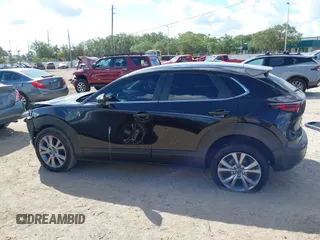2021 Mazda CX-30 Select z VIN 3MVDMABL1MM251761, wystawiony jako IAAI lot #42267217 z przebiegiem 42 617 mil mil oraz . Historia ofert i sprzedaży dostępna na DreamBid. Obrazek 13.