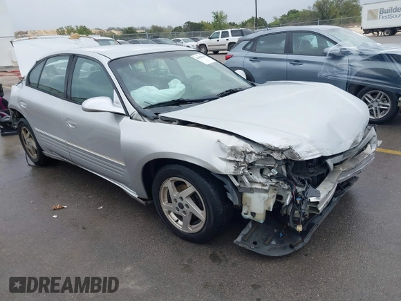 2003 Pontiac Bonneville SE z VIN 1G2HX52K034121638, wystawiony jako IAAI lot #41859616 z przebiegiem 205 353 mil mil oraz . Historia ofert i sprzedaży dostępna na DreamBid. Obrazek 1.
