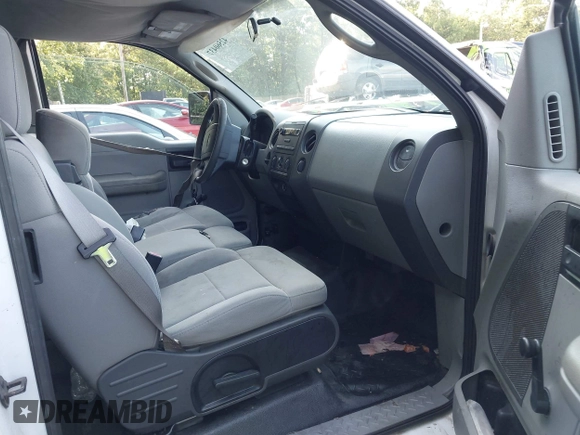 2007 Ford F-150 STX with VIN 1FTRX12W07FA84452, listed as a IAAI auction lot 42560437 with 314,539 mi miles and . Bid and sale history available at DreamBid. Image 5.