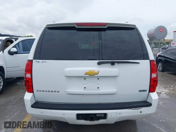 2012 Chevrolet Suburban LT with VIN 1GNSCJE00CR165813, listed as a IAAI auction lot 42494042 with 205,998 mi miles and . Bid and sale history available at DreamBid. Image 16.