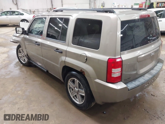 2008 Jeep Patriot Sport with VIN 1J8FT28WX8D549644, listed as a IAAI auction lot 41919125 with 125,859 mi miles. Bid and sale history available at carsss.com. Image 3.