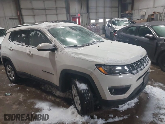 2020 Jeep Compass Latitude with VIN 3C4NJDBB3LT138454, listed as a IAAI auction lot 41614631 with 82,079 mi miles and . Bid and sale history available at DreamBid. Image 1.