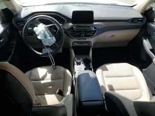 2020 Ford Escape Titanium с VIN 1FMCU9J93LUB38014, выставлен на аукционе Copart как лот 52348725 с пробегом 78 193 миль миль и Списание • Salvage title. История ставок и продаж доступна на DreamBid. Изображение 8.