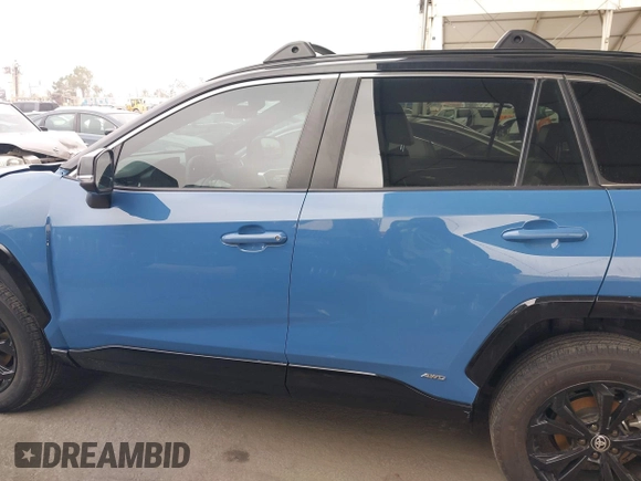 2023 Toyota RAV4 Hybrid XSE with VIN 2T3E6RFV4PW039496, listed as a IAAI auction lot 42488695 with 13,533 mi miles and . Bid and sale history available at DreamBid. Image 14.