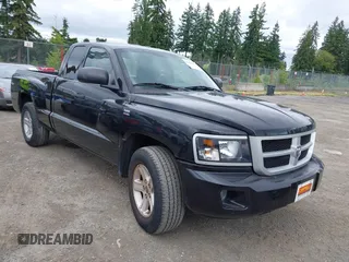 2009 Dodge Dakota z VIN 1D7HW32P09S798360, wystawiony jako IAAI lot #42426400 z przebiegiem 50 988 mil mil oraz . Historia ofert i sprzedaży dostępna na DreamBid. Obrazek 1.