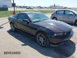 2012 Ford Mustang GT Premium with VIN 1ZVBP8CF8C5229808, listed as a IAAI auction lot 42239439 with 53,398 mi miles and . Bid and sale history available at DreamBid. Image 1.