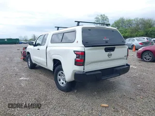 2023 Nissan Frontier S with VIN 1N6ED1CM3PN634833, listed as a IAAI auction lot 42139230 with 65,856 mi miles and . Bid and sale history available at DreamBid. Image 3.