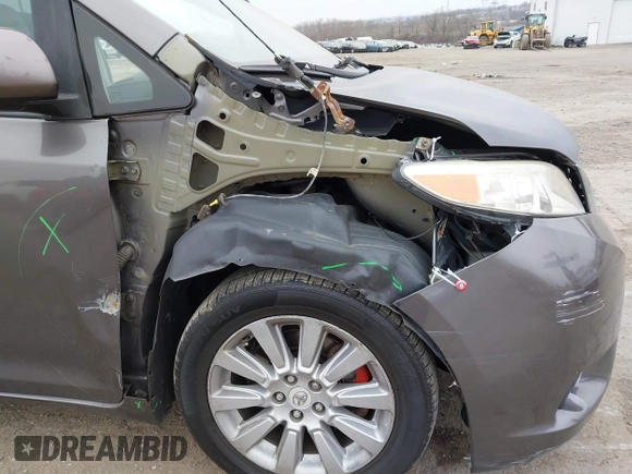 2012 Toyota Sienna LE with VIN 5TDJK3DCXCS047056, listed as a IAAI auction lot 41780756 with 179,624 mi miles. Bid and sale history available at carsss.com. Image 6.