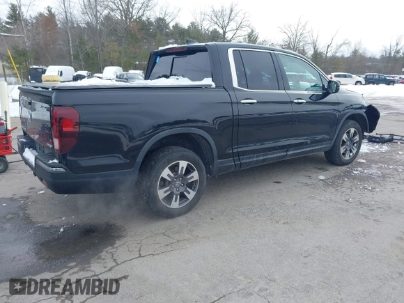 2018 Honda Ridgeline RTL-E z VIN 5FPYK3F78JB002172, wystawiony jako IAAI lot #41528764 z przebiegiem 64 566 mil mil oraz . Historia ofert i sprzedaży dostępna na DreamBid. Obrazek 4.
