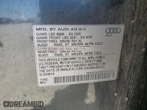 2015 Audi Q7 S line Prestige with VIN WA1DGAFE9FD002055, listed as a Copart auction lot 58073635 with 165,304 mi miles and Salvage title. Bid and sale history available at DreamBid. Image 12.