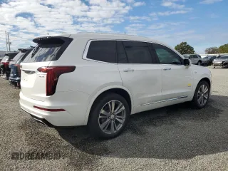 2021 Cadillac XT6 Premium Luxury z VIN 1GYKPCRSXMZ230618, wystawiony jako Copart lot #81022824 z przebiegiem Nie podano mil oraz Szkoda całkowita • Salvage title. Historia ofert i sprzedaży dostępna na DreamBid. Obrazek 3.