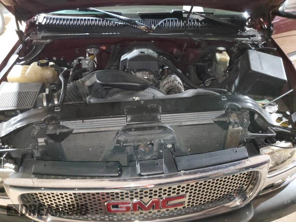 2000 GMC New Sierra 1500 SLE with VIN 1GTEK19T3YE218791, listed as a Copart auction lot 82482734 with 242,277 mi miles and Salvage Title. Bid and sale history available at carsss.com. Image 12.